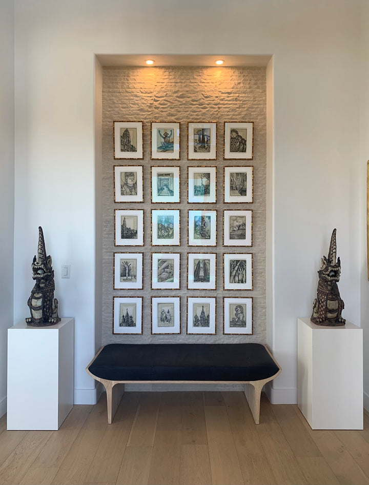 White laminate pedestals showcasing Thai dragons as part of a residential Thai art collection